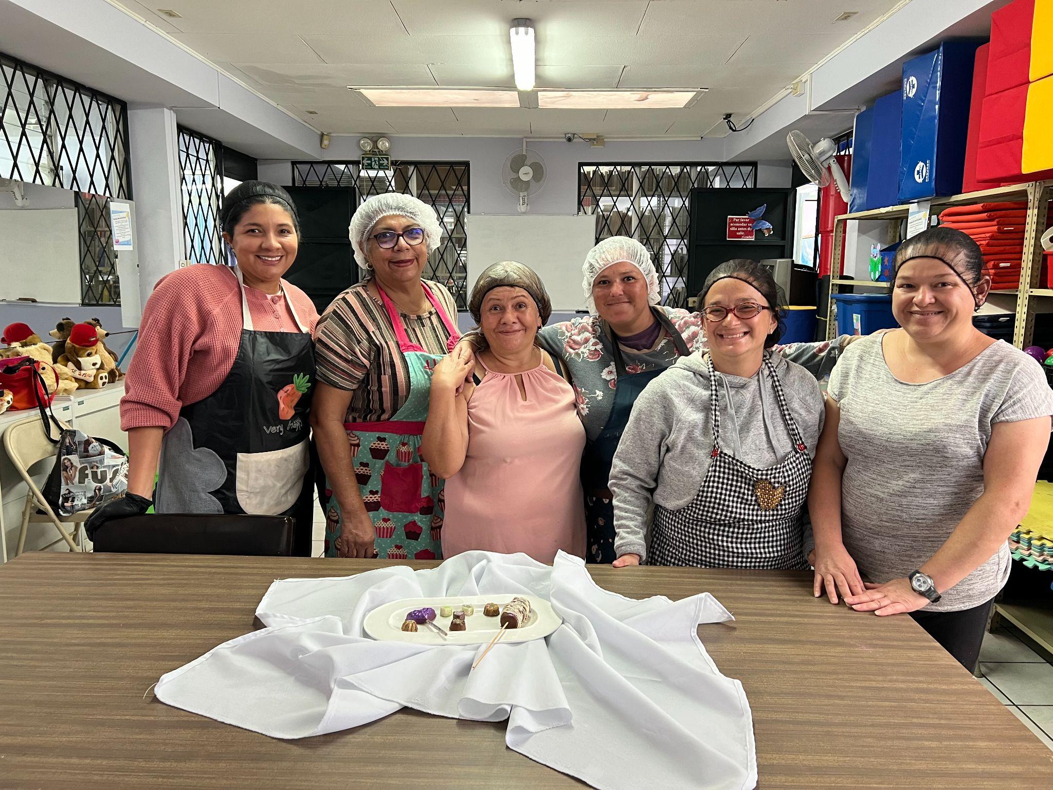 Women gathered after a ministry baking workshop.
